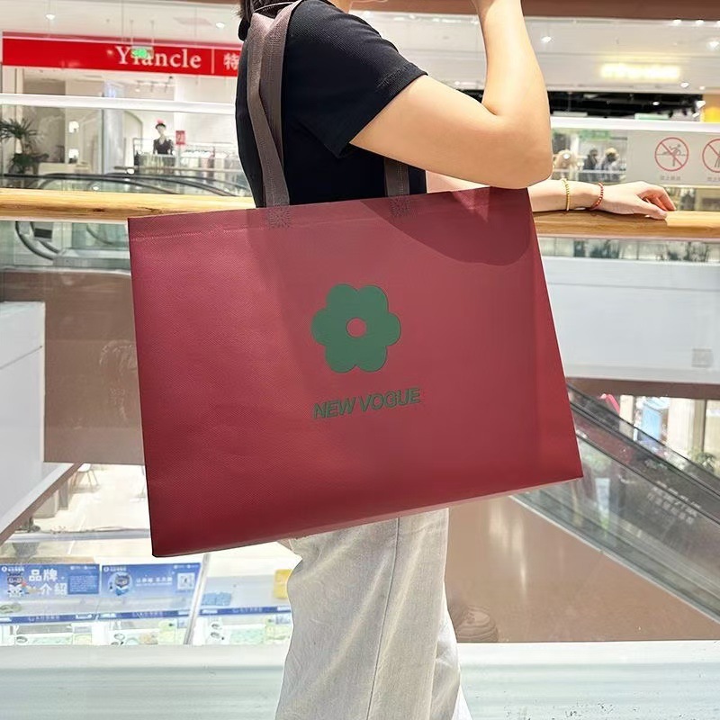 High-end film-coated non-woven bag handbag printed logo clothing store down clothing shoe store shopping bag advertising bag