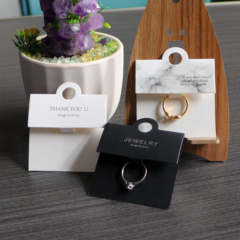 New Korean version of the white ring packaging hanging card small tail ring cardboard ring card can be printed logo head rope rubber band