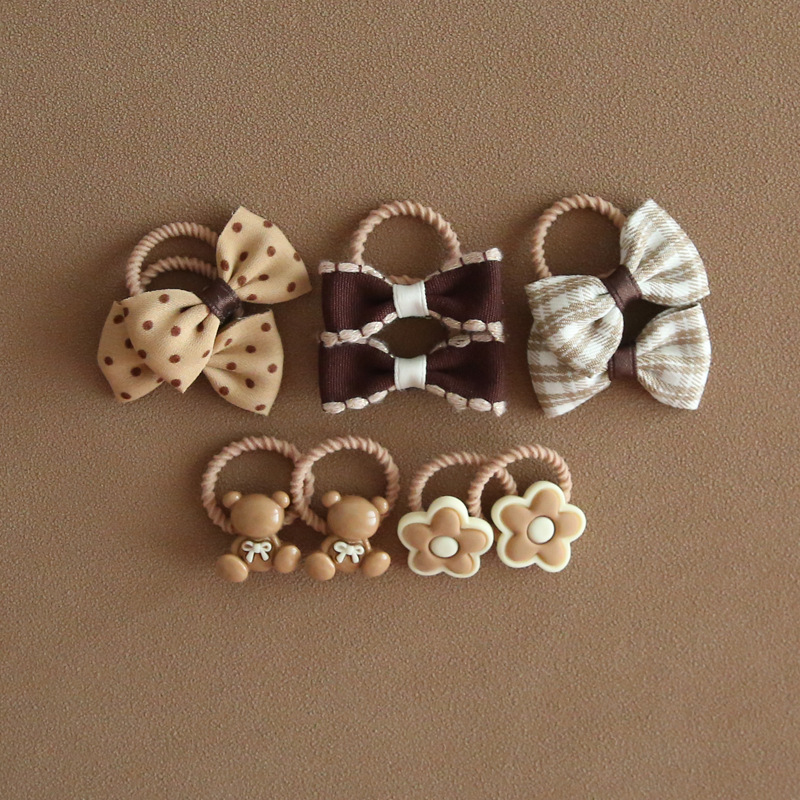 Picture of A152 factory wholesale children's cute headdress hair accessories baby mini bow thumb rubber band suit 1 set