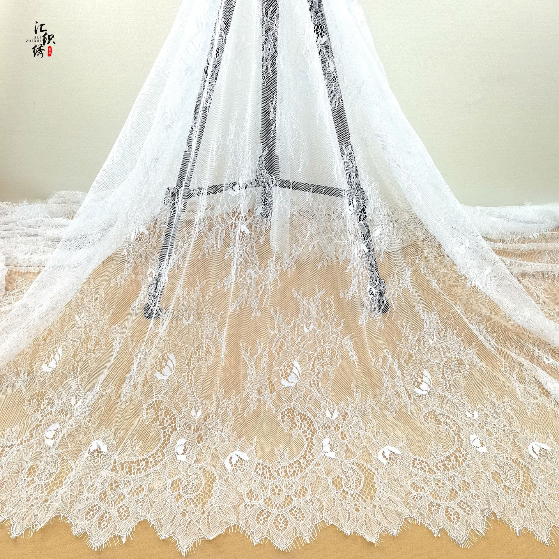 Spring and summer new in stock white eyelash lace fabric hollow dress wedding dress clothing lace fabric