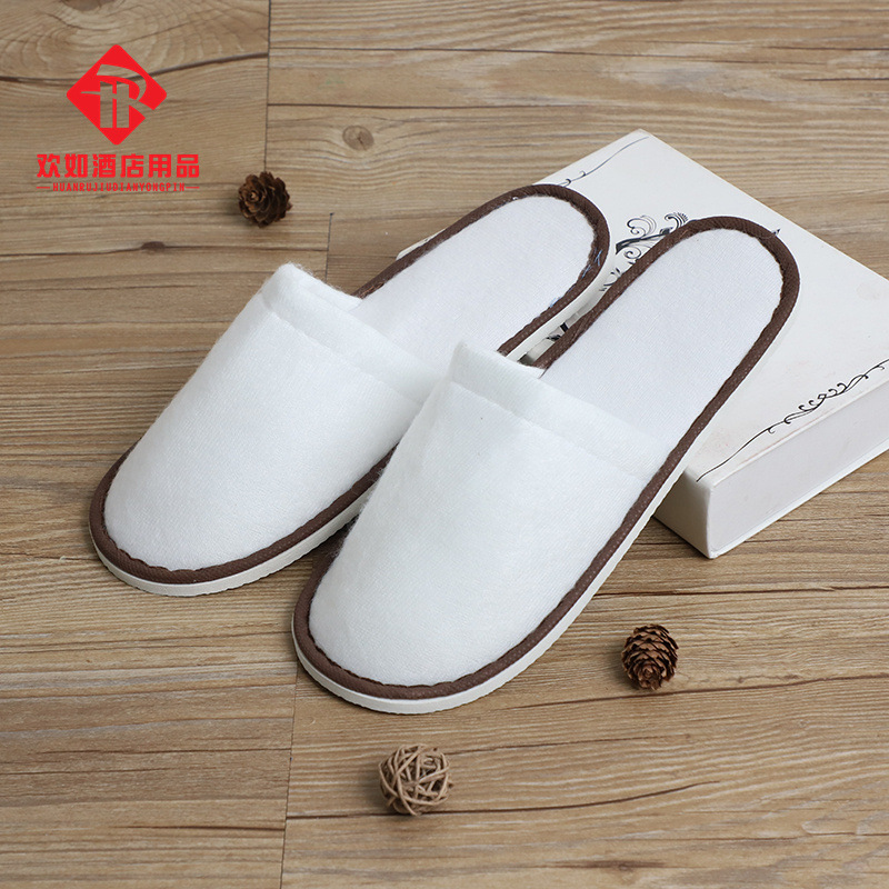 Picture of Hotel and homestay disposable waffle slippers home hospitality travel thickened slippers can be wholesale ordered LOGO