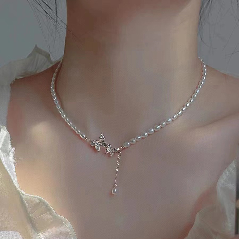 Picture of Zhuji freshwater pearl necklace necklace 5-6mm rice beads butterfly pendant 38 5cm length female clavicle chain wholesale