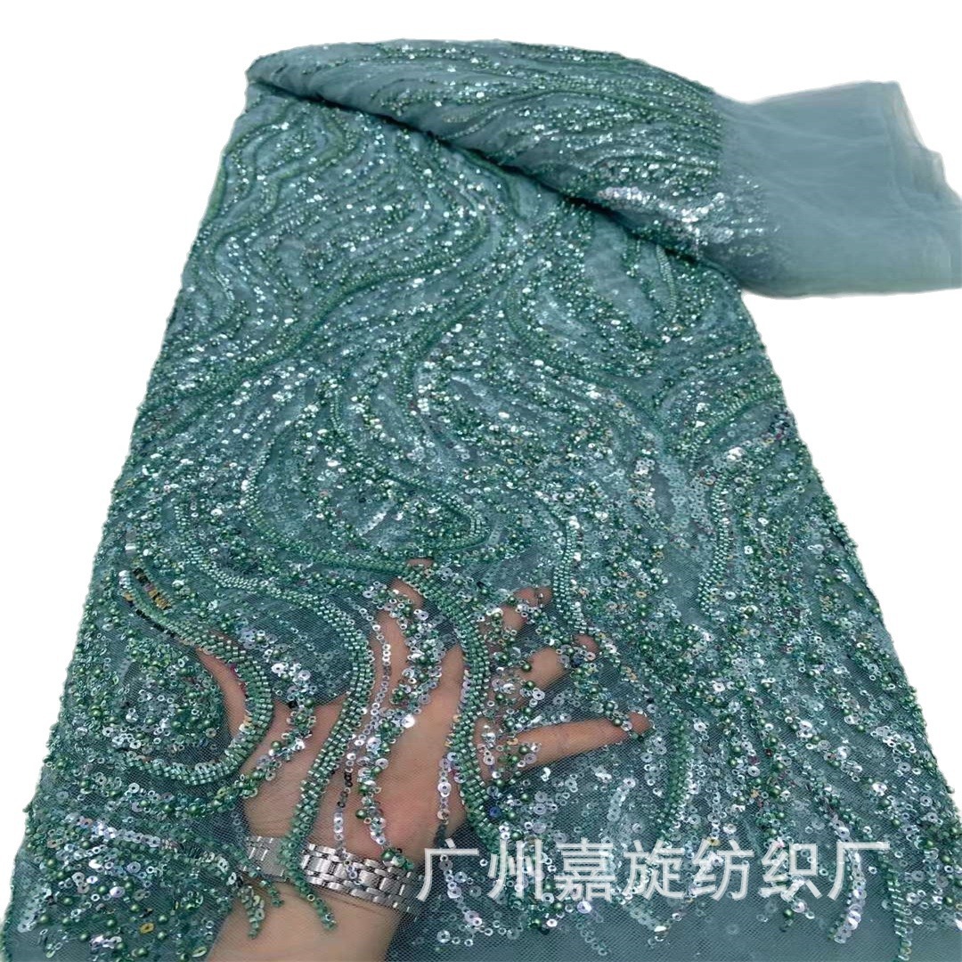 Picture of Spring and Summer 2024 New Polyester Mesh Size Fingerprint Sequin Bead Tube Embroidered Cloth African Fashion dress Dress Fabric