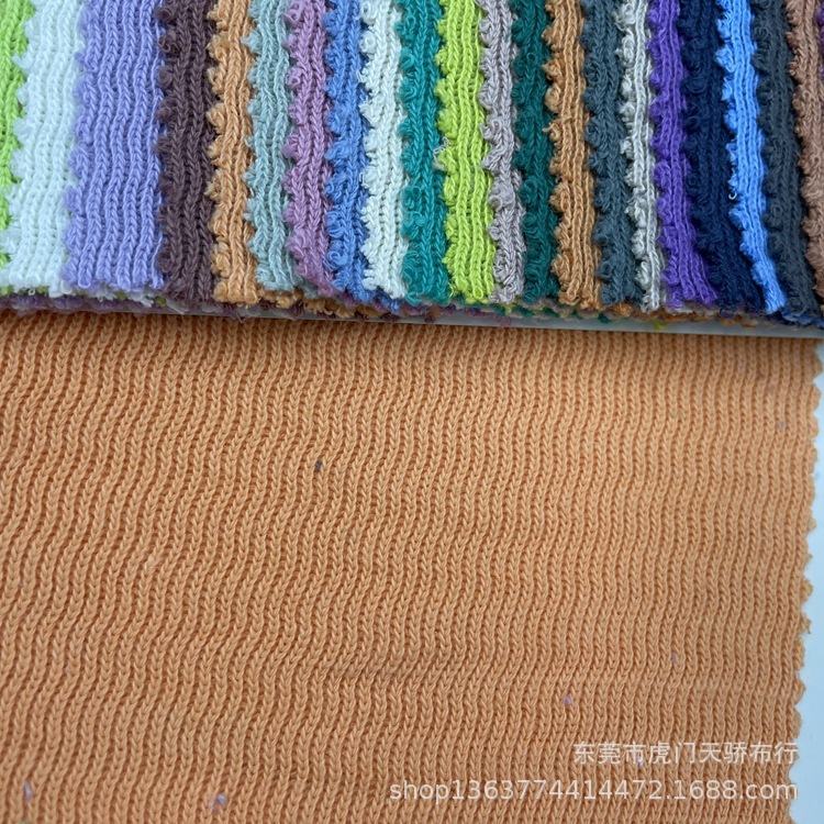 Spot supply of knitted polyester cotton irregular Niuniu thread 300g French corrugated wave 1*1 rib cloth