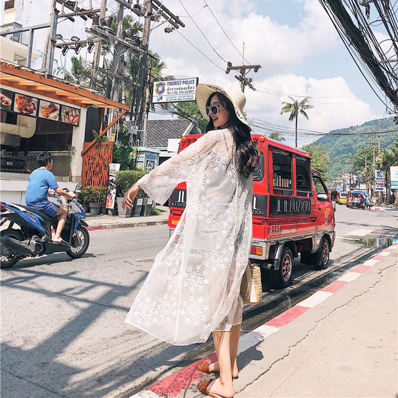 Picture of European and American Cross-border Sunscreen Clothing Women's Summer Seaside Vacation Mid-length Lace Coat Hollow Beach Bikini Blouse