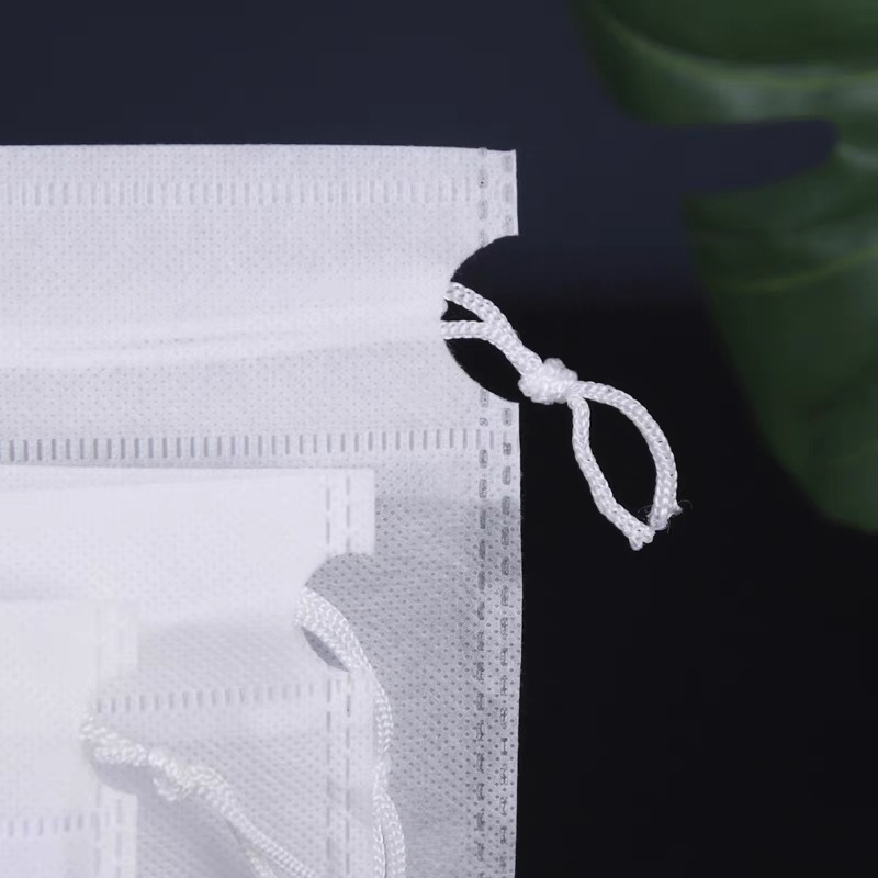Picture of Non-woven dustproof bag bundle pocket wholesale shoe overbag white travel storage flat pocket printable logo