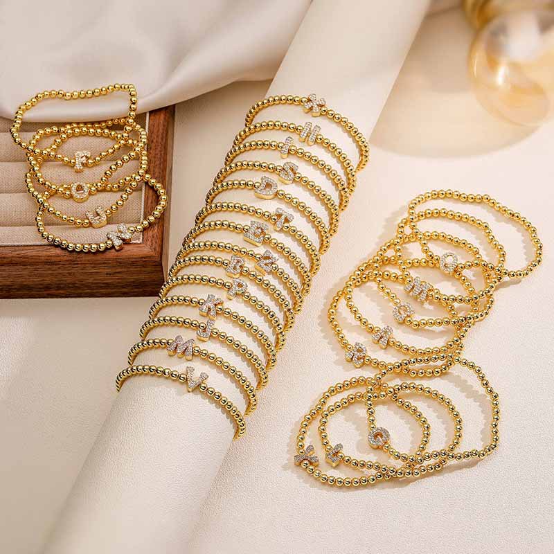 Cross-border Hot Selling Copper Inlaid Zirconium 26 English Letter Beaded Elastic Bracelet Niche Design Letter Round Beaded Hand Jewelry