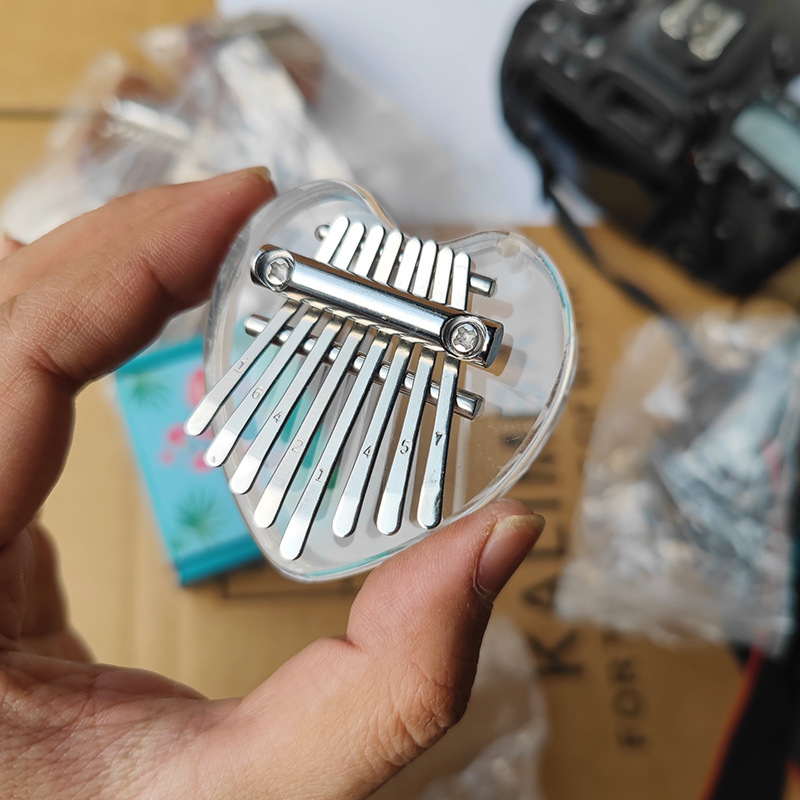 Picture of Mini Thumb 8-Tone Mini Calimba Crystal Transparent Five-Finger Portable Beginner's Finger Instrument