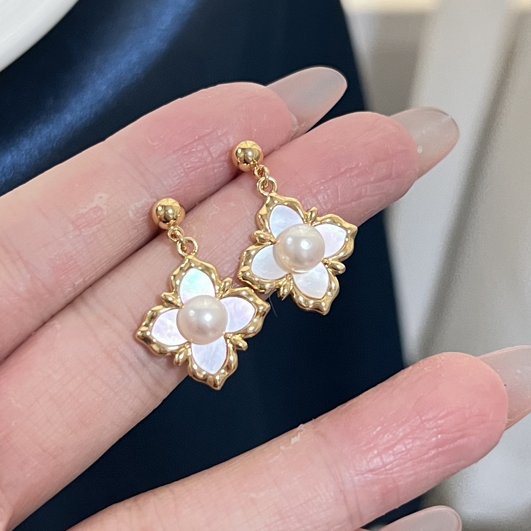 Ins style retro three-dimensional four-leaf flower temperament French sweet S925 silver pin earrings 14k bag gold earrings earrings women