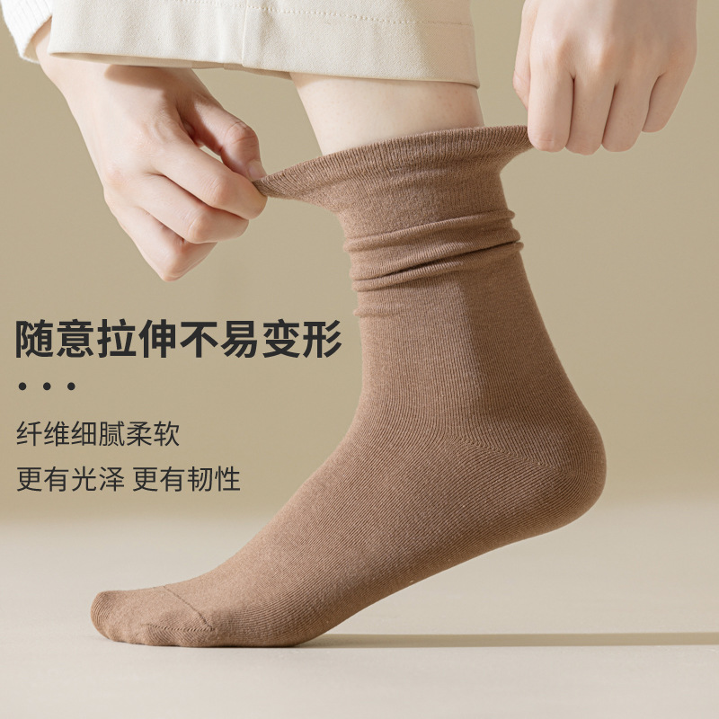 Picture of Socks Women's Mid-Calf Ins Trendy Versatile Confinement Socks Pure Color Autumn and Winter Retro Style Pile Socks White Socks Long Socks