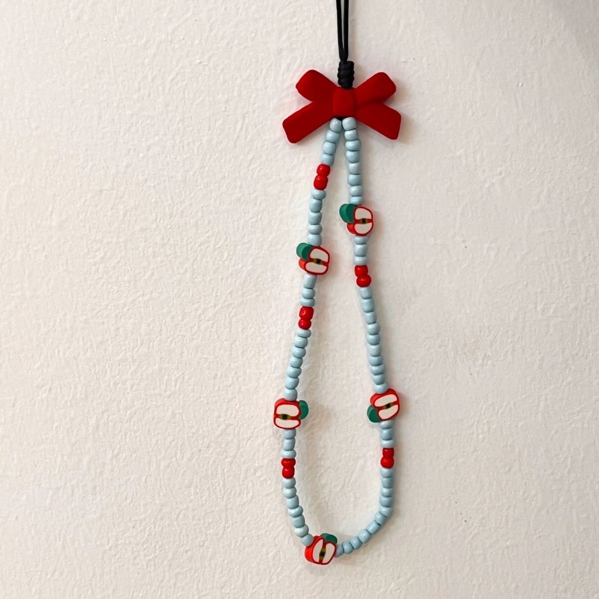 Color bow mobile phone chain ins blue beaded diy lanyard keychain red blue rice beads apple small pendant