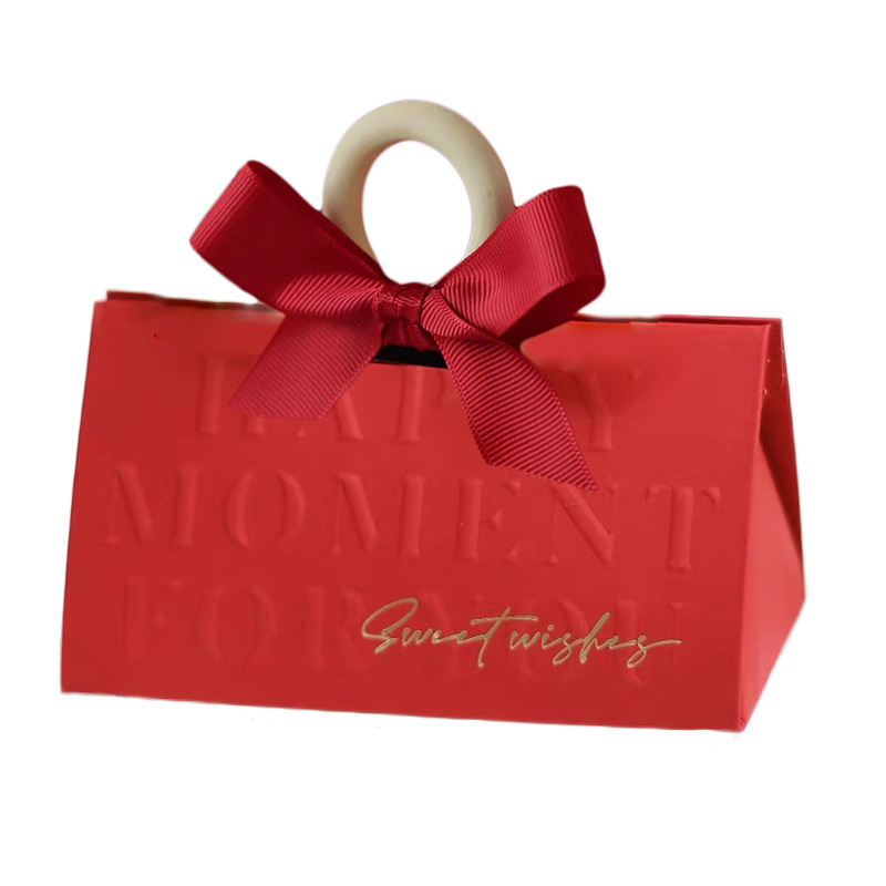 Picture of Light luxury champagne hand-held triangle wedding candy box wooden ring hand gift box wedding candy box wholesale