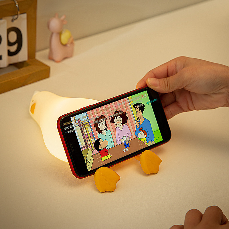 Picture of Cross-border Creative Lying Flat Duck Silicone Lamp Children's Nursing Bedside Accompanying Sleep Pat Charging Holiday Gift Night Light