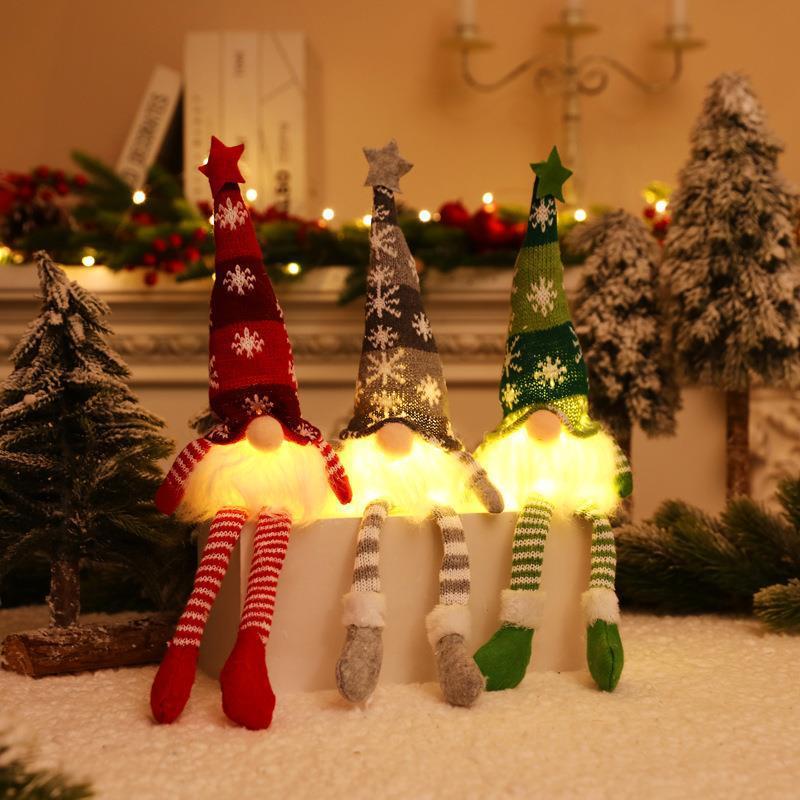 Christmas decorations window ornaments with lights glowing old man doll simple cute dress bedroom living room