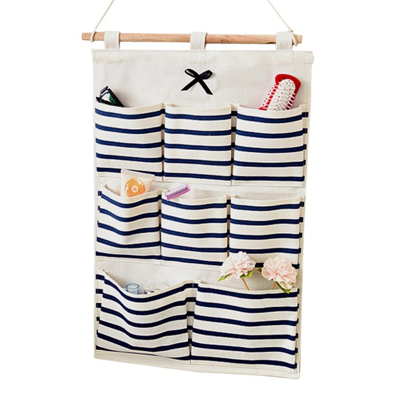 Korean version of simple fabric cotton and linen hanging bag hanging waterproof PE film door back multi-layer storage hanging pocket wholesale