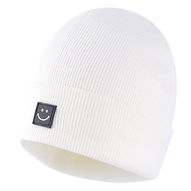 Children's knitted hat smiling face baby wool hat European and American Joker cute smile pattern hat autumn and winter beanie