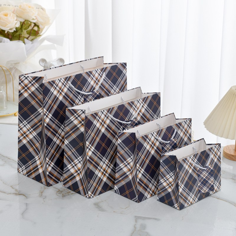 Picture of New horizontal plate thickened gift bag business fashion gift hand-held paper bag stationery jewelry store clothing packaging bag