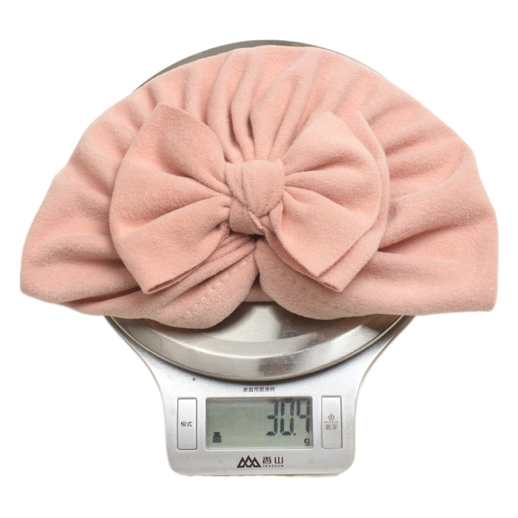 European and American autumn and winter new German velvet children's soft bow cap baby warm solid color pullover cap baby hat
