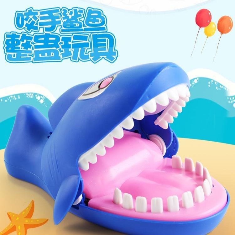 Shark toy press the teeth and mouth will move and bite the soft teeth big white shark trick the whole person new strange children's toy