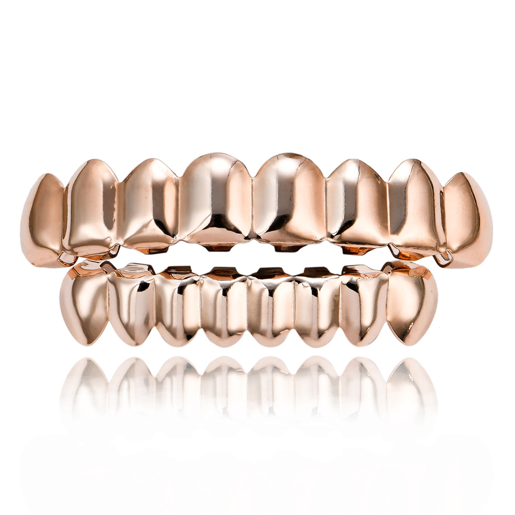 Picture of Europe and the United States HIPHOP hip-hop gold braces upper teeth 8 lower teeth 8 real gold plating 18K gold hip-hop braces wholesale