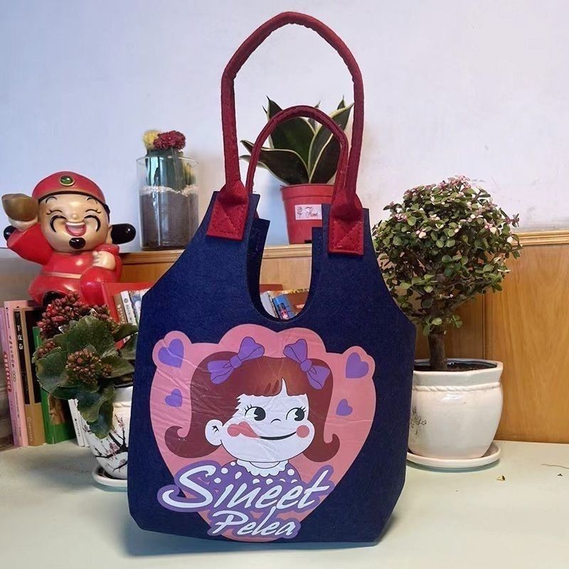 Picture of New Cyber Celebratory Cartoon Student Handbag Super Cute Cartoon Cute Rabbit Felt Bag Full Moon One Year Old Bag Mend-up Bag