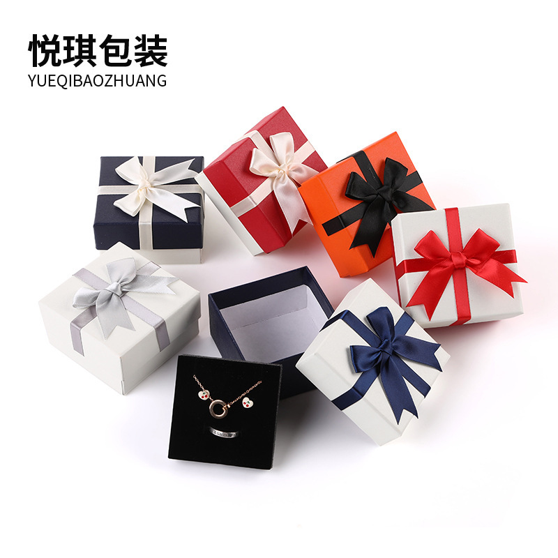 Custom jewelry packaging carton English letter ribbon jewelry box heaven and earth cover bronzing ring necklace packaging carton