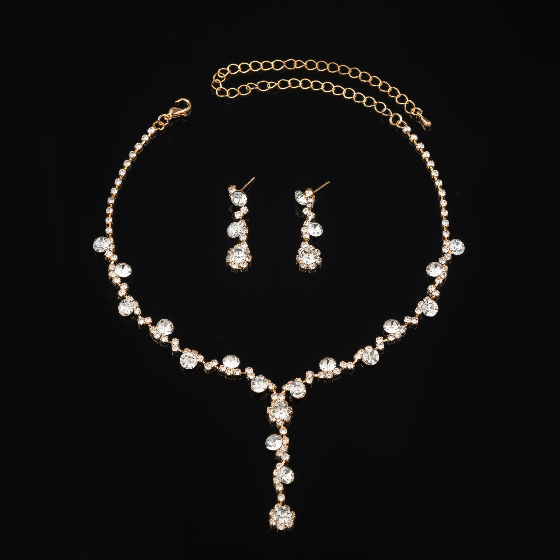 Picture of European and American Fashion Copper Flower Rhinestone Necklace Earrings Bracelet Evening Bag Party Jewelry All-match Bride Four-suit