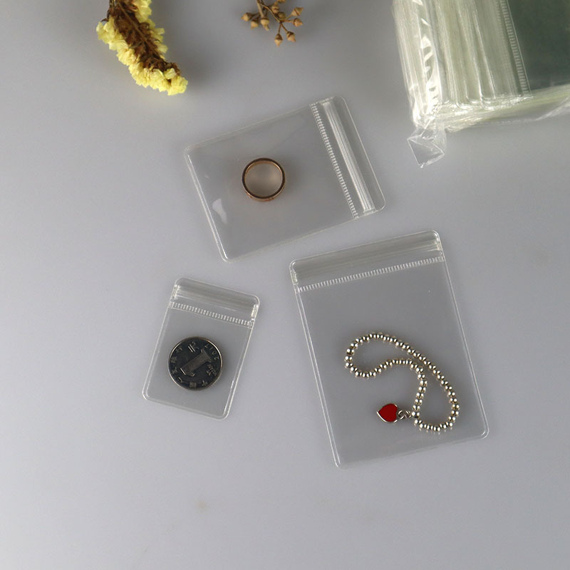 Transparent pvc self-sealing bag earrings jewelry storage bag jewelry packaging bag high transparent text play bag pinch bag
