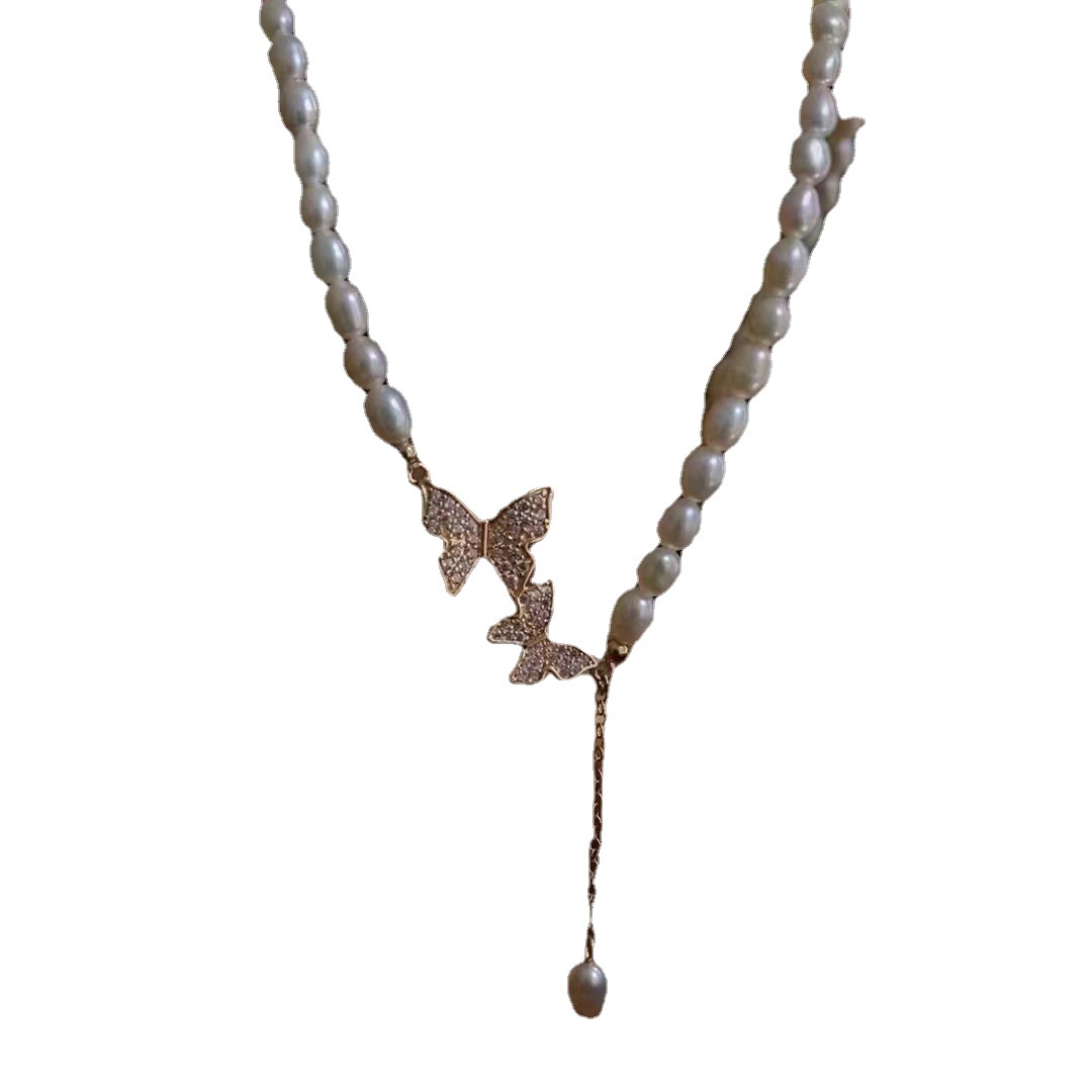Picture of Zhuji freshwater pearl necklace necklace 5-6mm rice beads butterfly pendant 38 5cm length female clavicle chain wholesale
