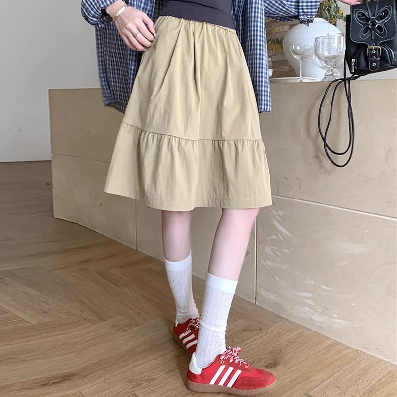 Cross-border collegiate style khaki skirt 2025 spring new design and youthful Japanese pocket midi skirt A-line skirt