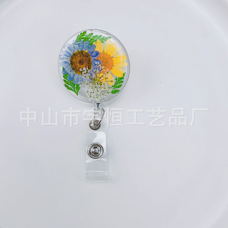Picture of 2022 Cross-border Dried Flower Easy Pull Button Real Flower Transparent 360-degree Easy Pull Doctor Nurse Scroll Badge