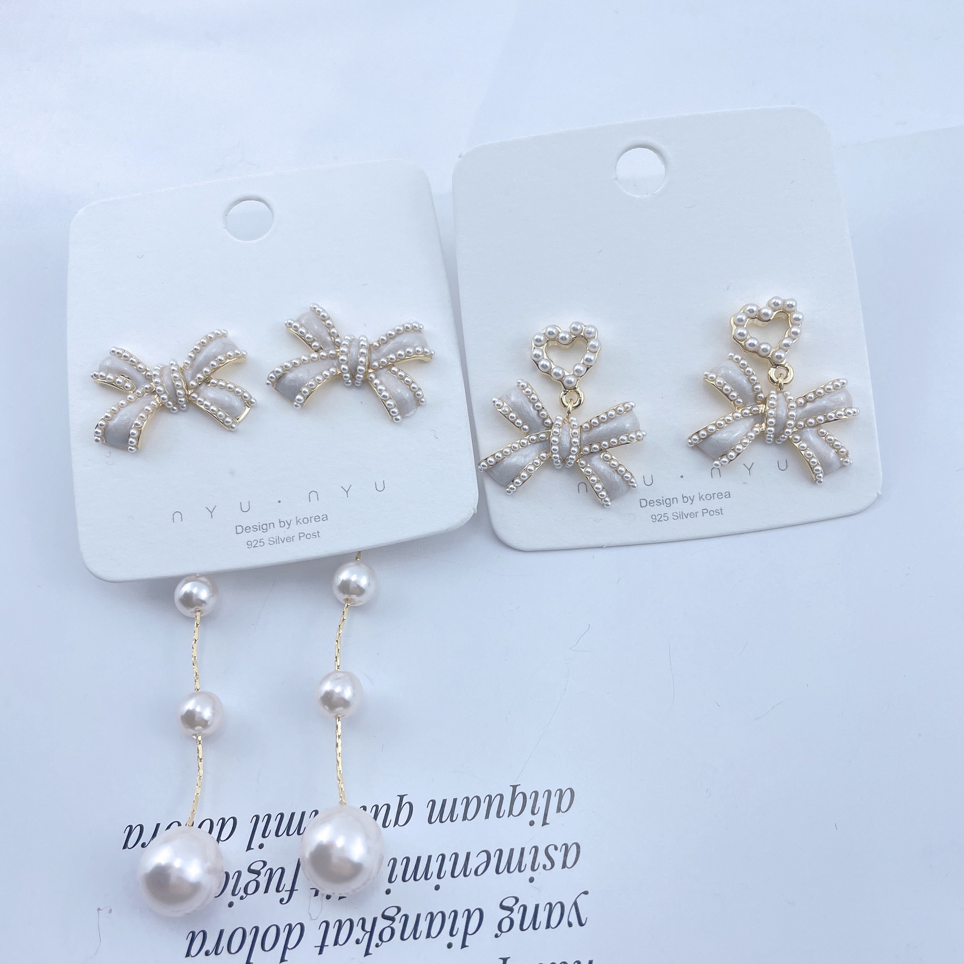 Fashion Ol Simple Tassel Long Pearl Earrings for Women Drip Glaze Bow Pearl Earrings High-End Earrings Wholesale