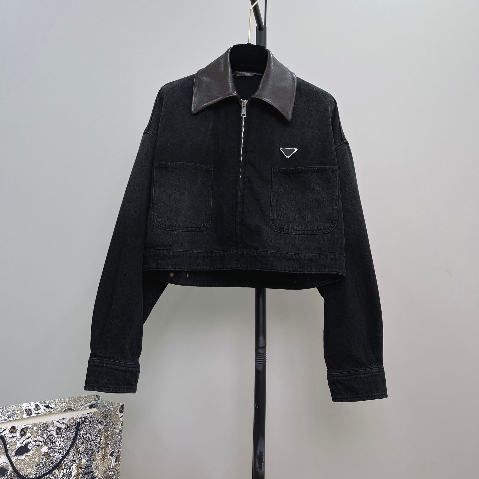 Picture of High-End Heavy-Duty Zipper Denim Jacket for Women with Chest Pocket Triangle Logo Genuine Leather Lapel Short Jacket Top