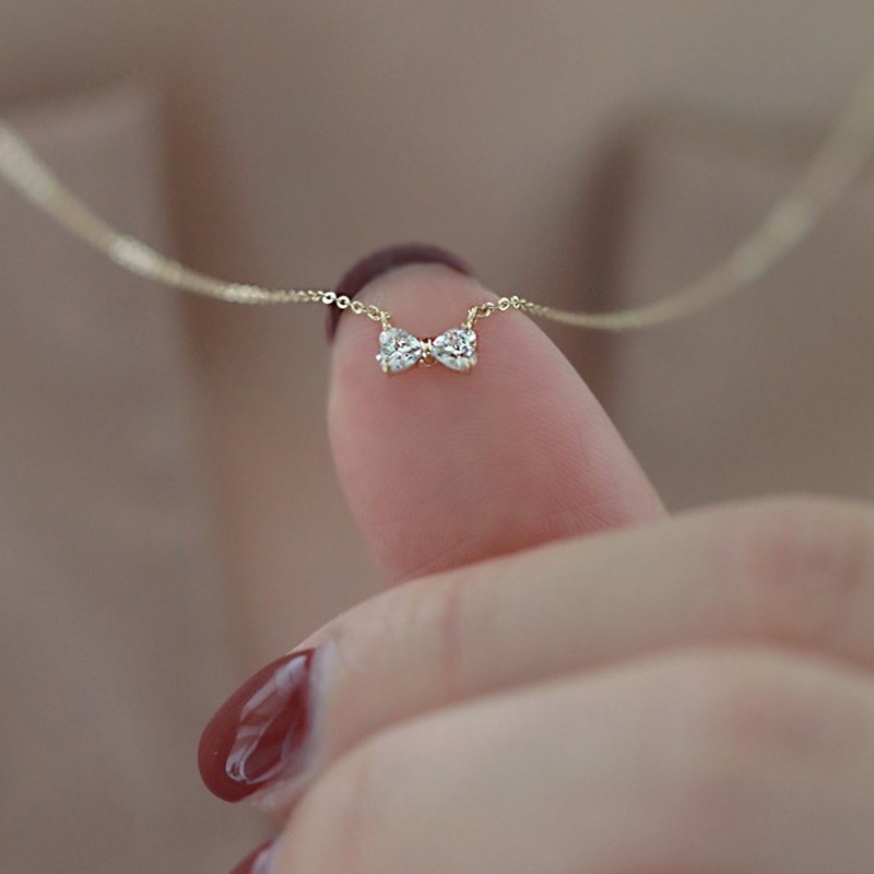 AliExpress hot sale s925 sterling silver bow necklace 14K gold ins style niche light luxury heart-shaped mini pendant