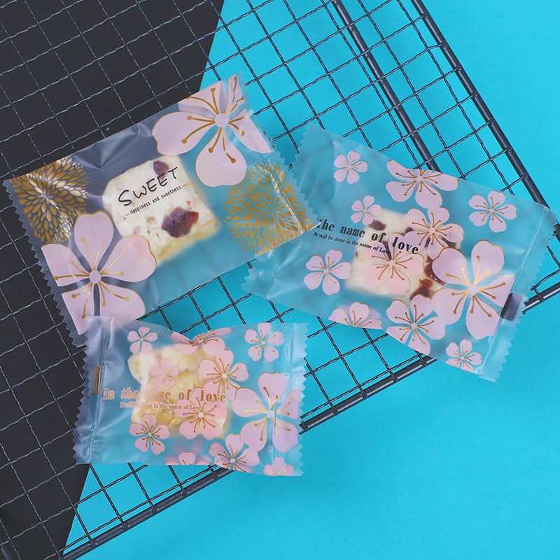 Factory direct snowflake crisp cow rolled cake cranberry biscuit packaging bag baking small food machine bag