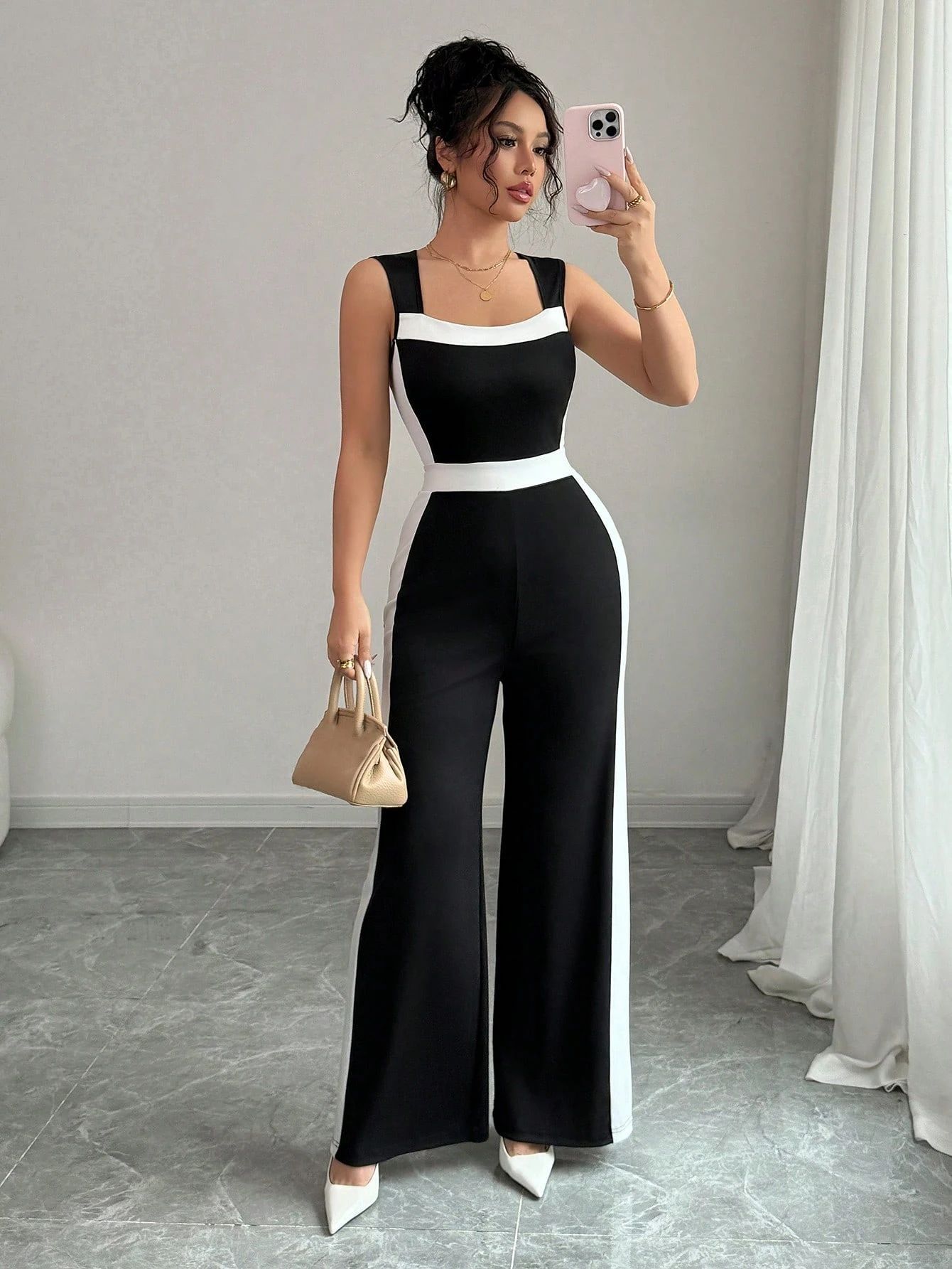 Picture of Cross-border European and American clothing 2025 women's spring and summer vacation style European and American temperament color-blocking sleeveless wide-leg jumpsuit