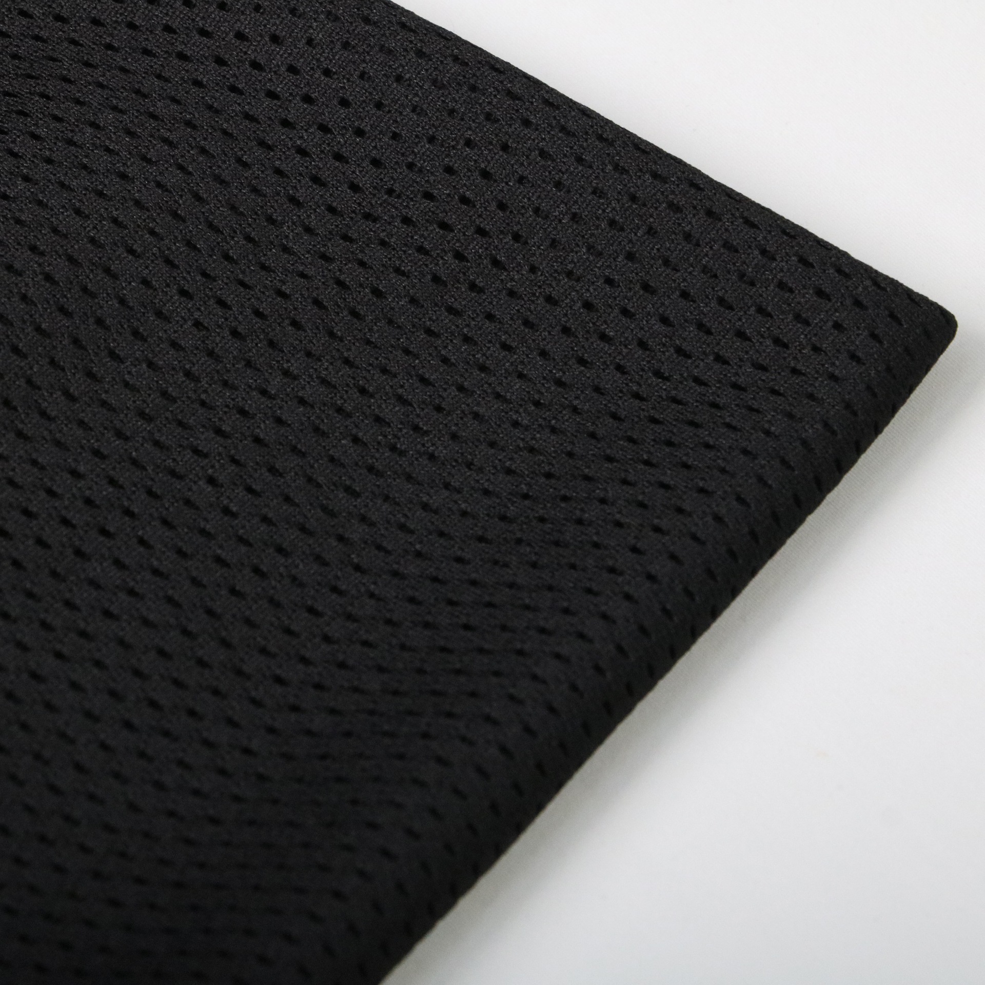 Picture of in stock Polyester Warp Knitted Low Elastic Bullet Hole Triangle Cloth Peach Mesh Breathable Moisture-wicking Sportswear Lining