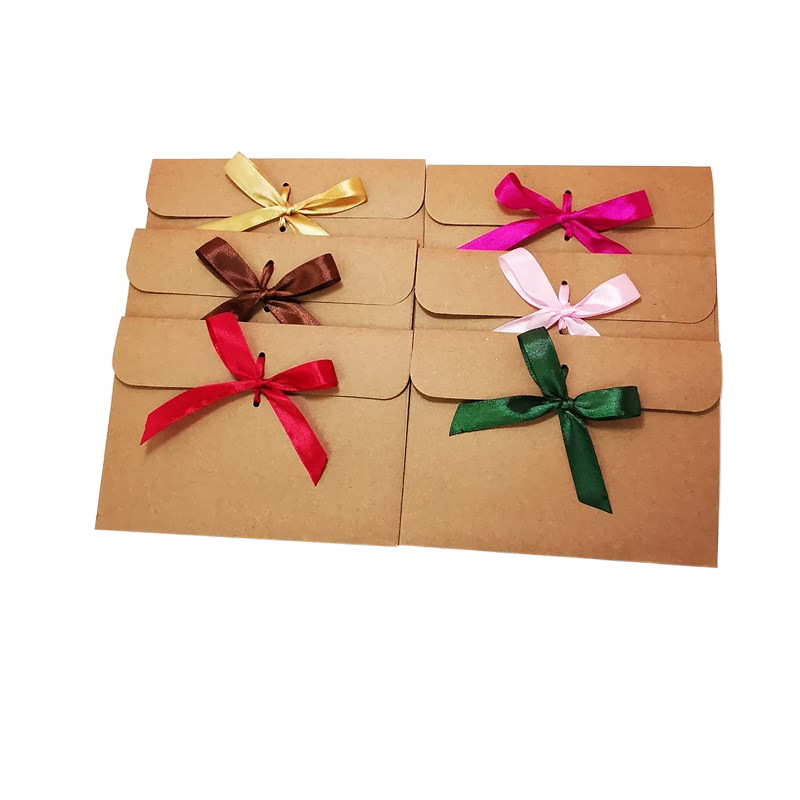 Picture of European envelope Kraft paper style vintage greeting card blessing card packaging bag creative bow CD bag wholesale