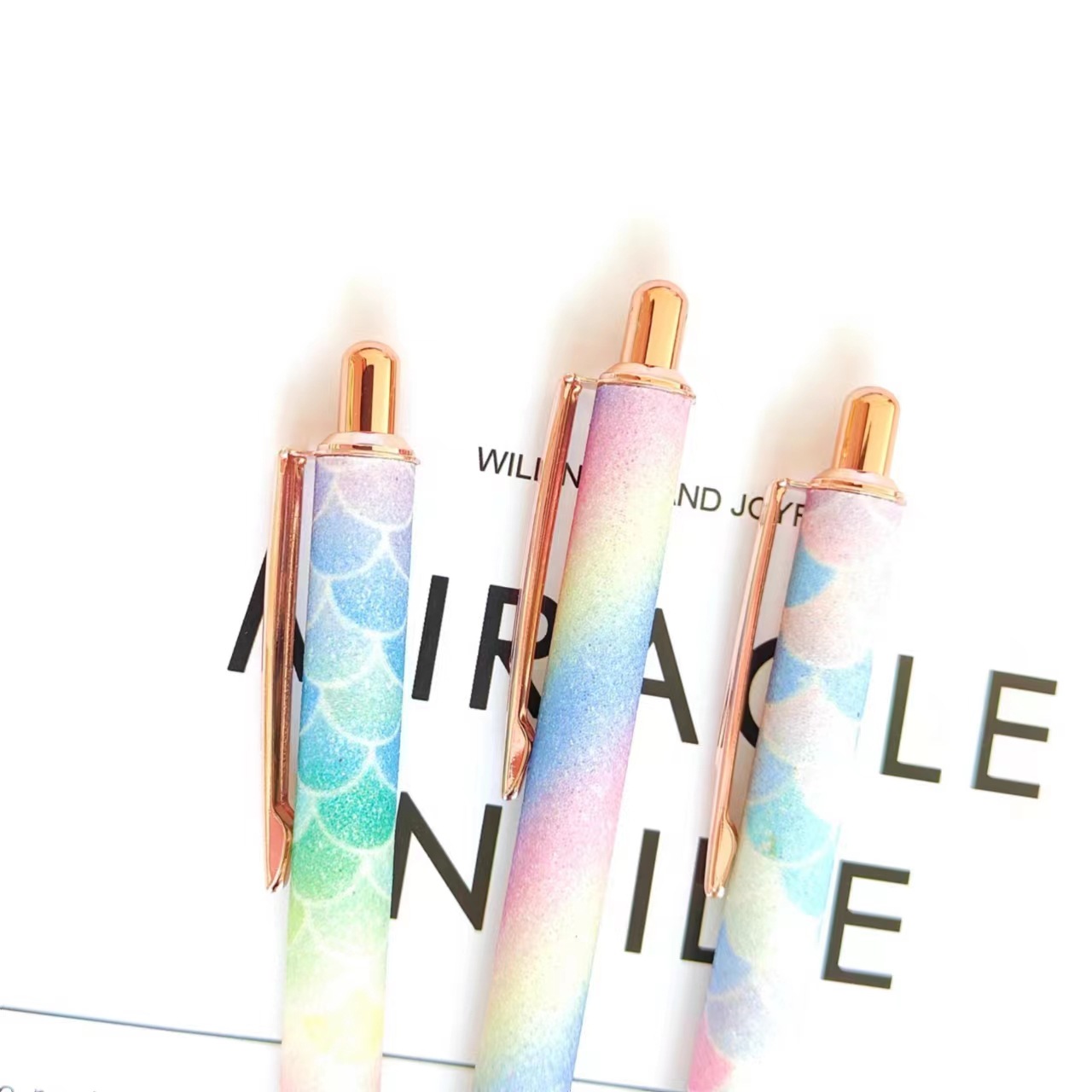 Picture of Press ball pen spot wholesale gold pink press pen creative rainbow PU foreskin gift advertising