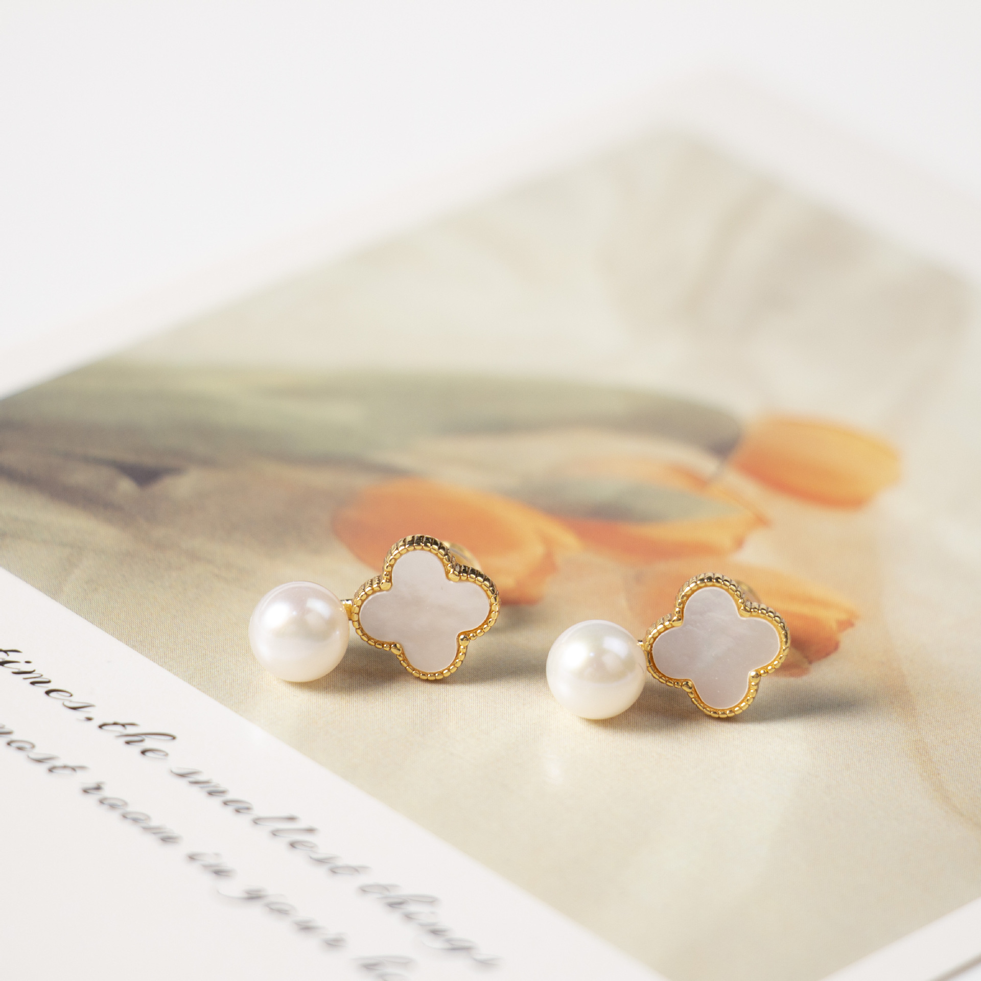 Zhuji natural freshwater pearl earrings women S925 silver needle simple fashion new four-leaf clover pearl earrings wholesale