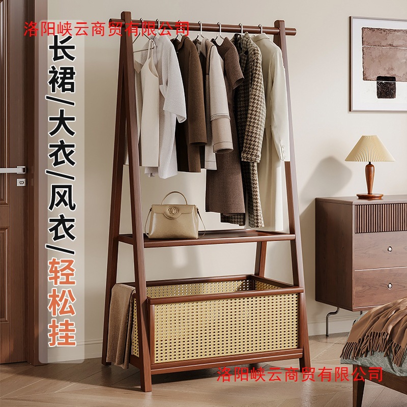 Picture of Vertical hanger floor simple coat rack rack for hanging clothes in a home room is foldable and durable drying rack