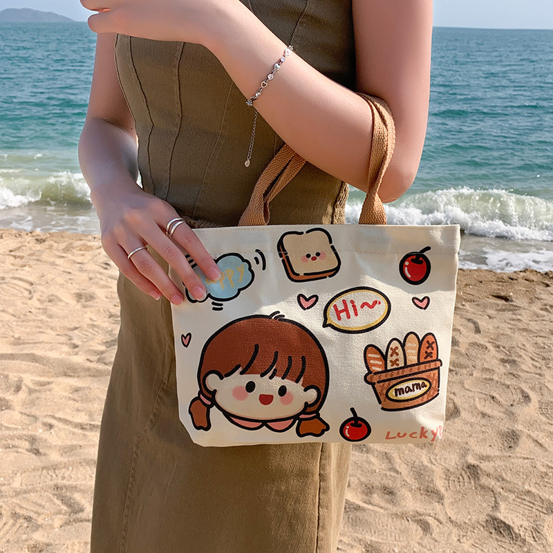 Picture of 2025 New Cute Cartoon Japanese Style Canvas Bag Tutorial Lunch Bag Manufacturer Wholesale Bag Women's Bag Handbag