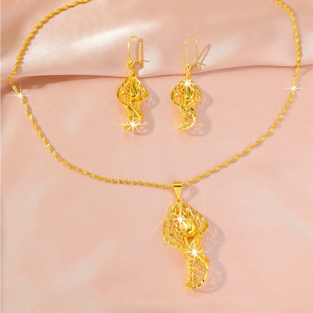 Picture of Middle East Dubai Wedding suit Jewelry Vietnam Sand Gold Hollow Leaves Water Drop Necklace Earrings Long-term Color-free Jewelry