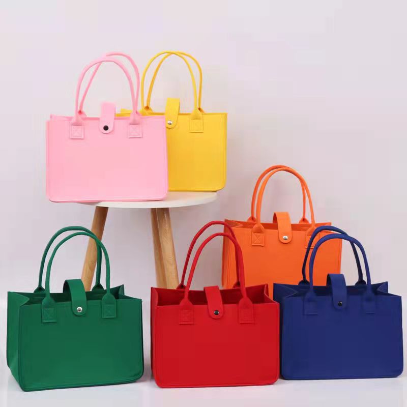 Picture of 2022 felt cartoon handbag hand bag gift bag Net Red full moon wine birthday gift bag wholesale