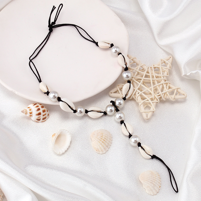 Picture of European and American Cross-border Jewelry Ethnic-style Handmade Shell Pearl Finger-linked Foot Chain for Women Simple Beach Woven Foot Decoration for Women