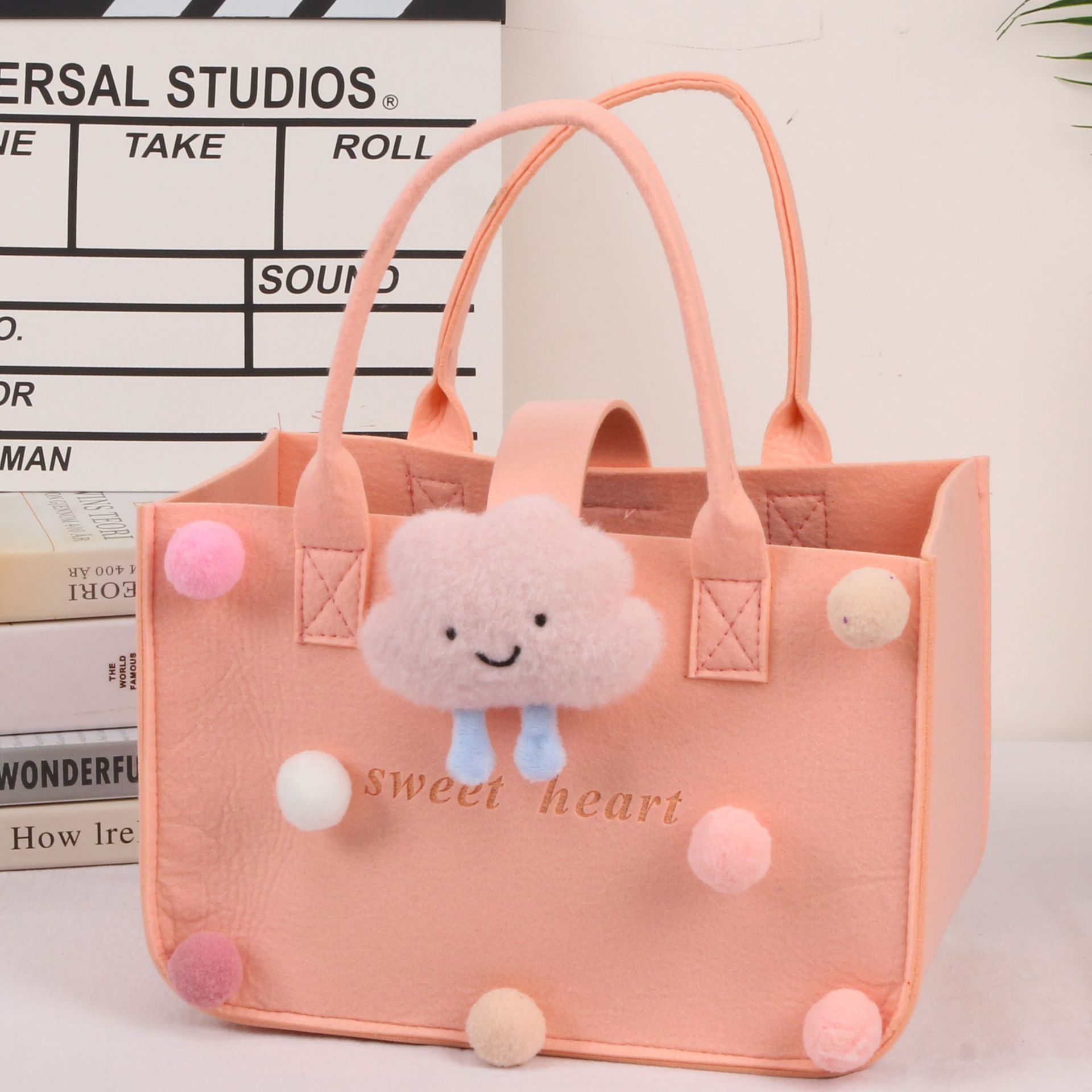 Picture of 2022 felt cartoon handbag hand bag gift bag Net Red full moon wine birthday gift bag wholesale