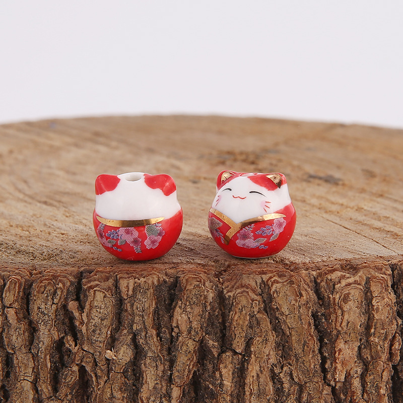 Picture of Japanese-style ceramic lucky cat beaded vertical hole cat pendant jewelry mobile phone chain ceramic cat bracelet DIY loose beads wholesale