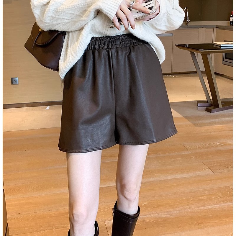 Leather shorts women's 2025 spring and autumn new high waist slimming Joker pu leather pants wide leg elastic A- shaped outer wear boot pants.