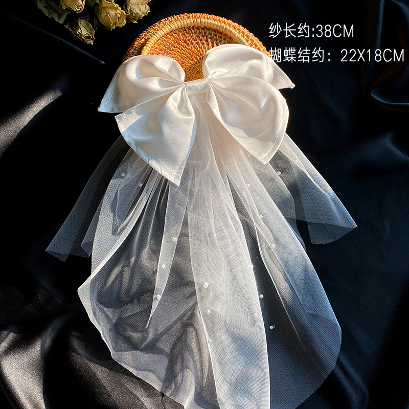 Picture of 2024 New Arrival Bow Veil Super Fairy Wedding Travel Photo White Satin Mesh Hairpin Bridal Hair Accessories