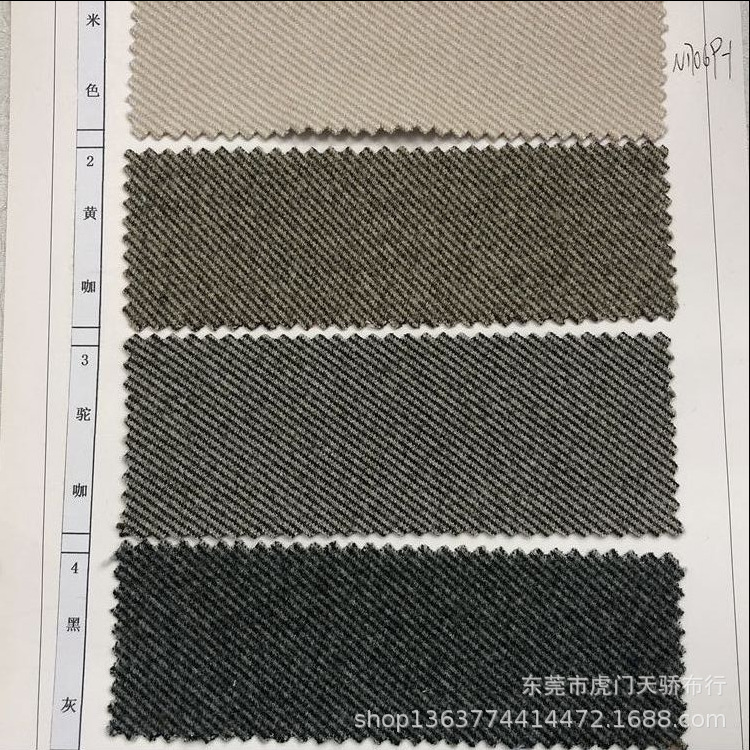 Spot supply of autumn and winter New woolen coat fabric 700 grams of knitted tweed yarn-dyed tweed woolen cloth